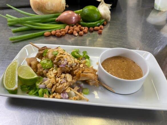 Plated Satay: Peanut Sauce with Chicken Skewers